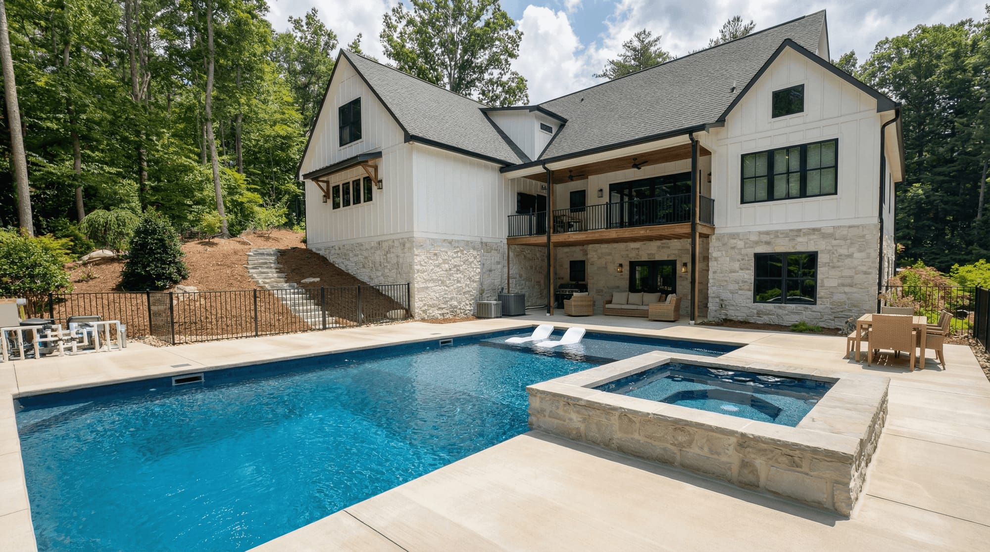 Beautifully designed outdoor patio and pool area showcasing Trademark Outdoor Services craftsmanship